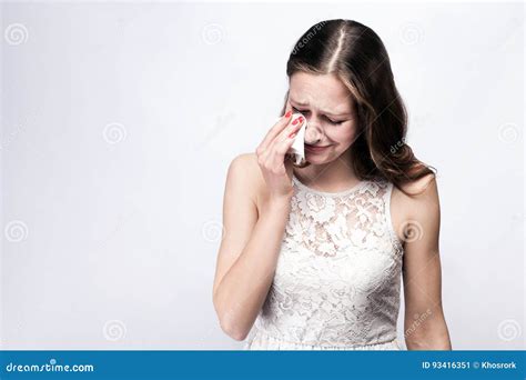 Portrait Of Sad Unhappy Crying Woman With Freckles And White Dress And