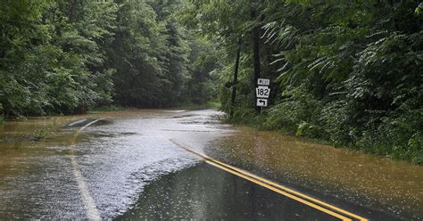 Photos Rain Causes Flooding Road Closures