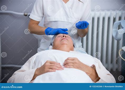 Anti Aging Treatments Massaging Face Of The Client Stock Photo Image