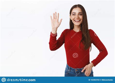 Friendly Outgoing And Sociable Pretty Brunette Girl In Red Sweater Delighted To Greet Friend