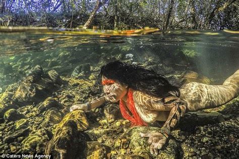 stunning photos show native brazilians swimming underwater native american beauty people of