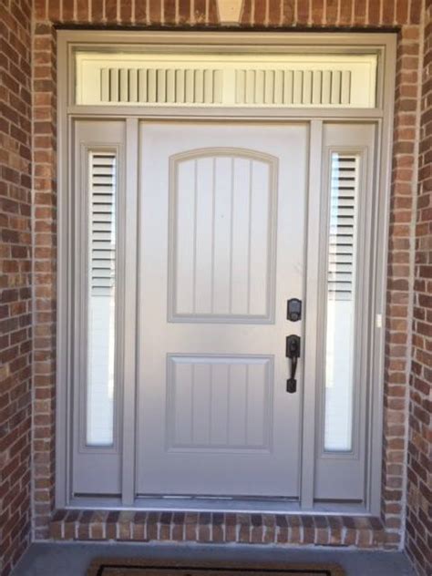 Norman Shutters On Front Door Sidelights Columbia Blinds And Shutters