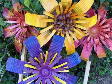 The traditional choice, wooden garden buildings remain ever popular despite the emergence of modern alternatives like plastic and metal. Upcycled/Recycled Metal Can Flowers garden art in Custom ...