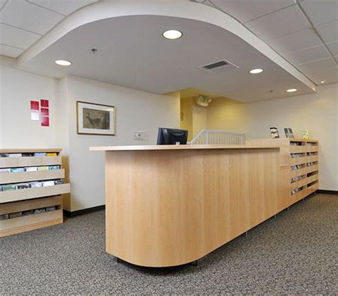 Commercial reception furniture is designed to meet the needs of your staff and students, as well as welcome visitors of all shapes and sizes. Circulation Desks | Custom reception desk, Reception desk, Media center