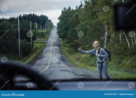 Blonde Woman Hitchhiking Stock Image Image Of Route 63221497
