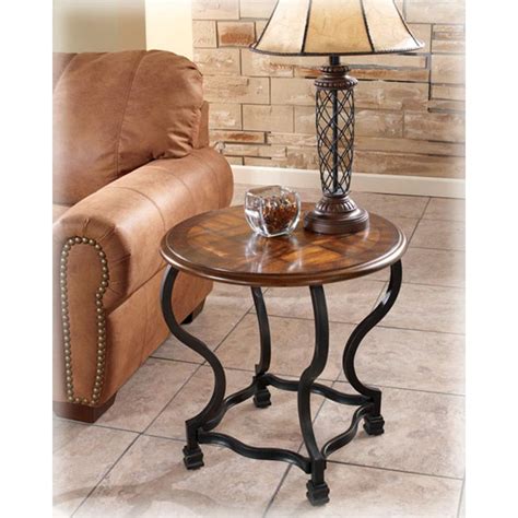 T256 6 Ashley Furniture Wycliffe Round End Table