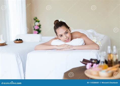 Young Beautiful Asian Woman Smile Relaxing In The Spa Stock Image Image Of Hair Flower 110588681