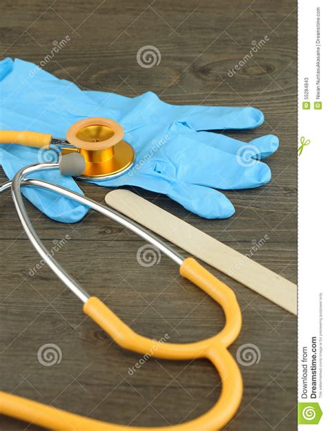 Our tongue depressor can be individual paper wrapped. Stethoscope, Wooden Tongue Depressor And Glove Stock Image ...