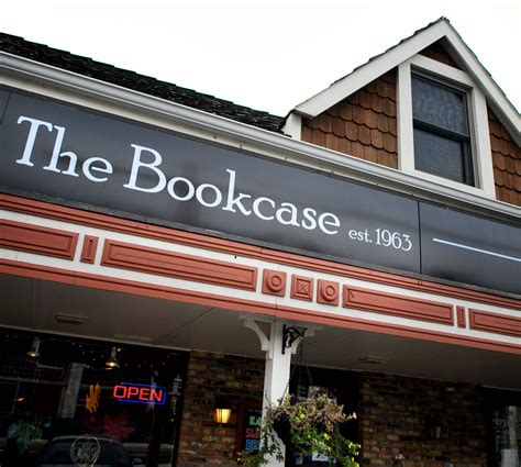 the bookcase restaurant is located in an old brick building with red