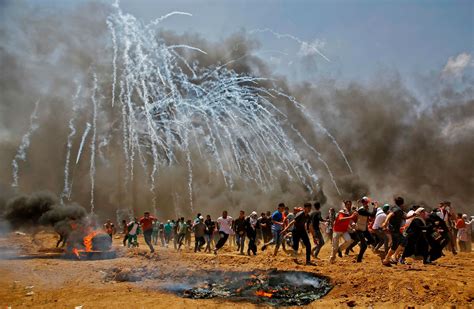 Contrasting Images Violence In Gaza Embassy Celebration In Jerusalem