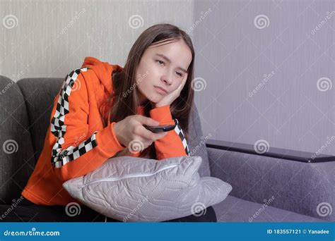 Young Woman Watching Tv Uninteresting Falling Asleep From Boredom