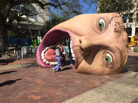 Giant Human Head Swallows Visitors In Hemming Park Wjct News