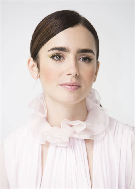 Lily Collins At Rules Dont Apply Press Conference In Beverly Hills