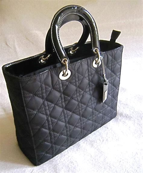 Inclosed Classic Black Quilted Handbag