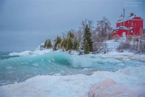 Marquette Harbor Lighthouse In Michigans Upper Peninsula During An Ice