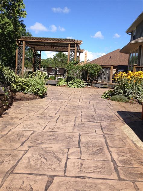 English Yorkstone Stamped Concrete Walkway In Kilworth Ontario Colored