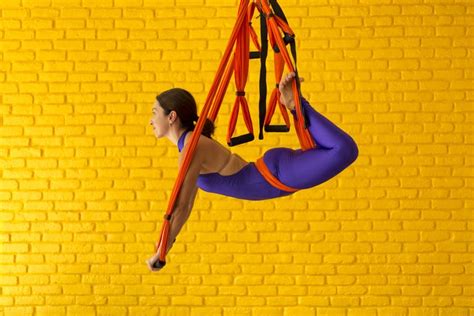 aerial yoga tips for beginners health benefits poses and more