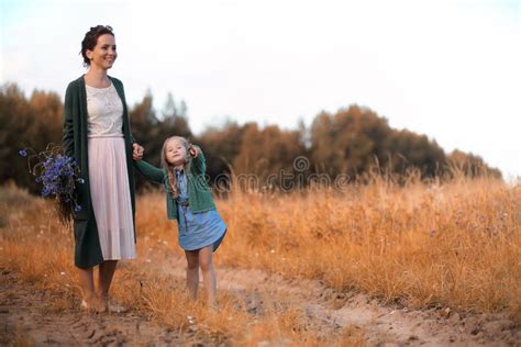 Mother With Daughter Walking On A Road Stock Photo Image Of Love