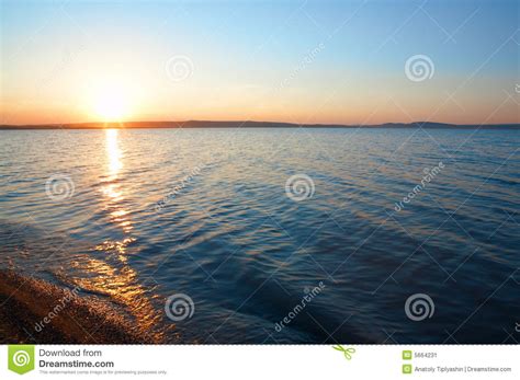 Sunrise On Blue Water Stock Image Image Of Water Nature 5664231