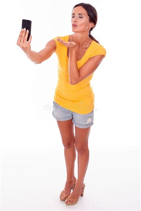 Gesturing Brunette Woman Taking A Selfie Stock Photo Image Of Black