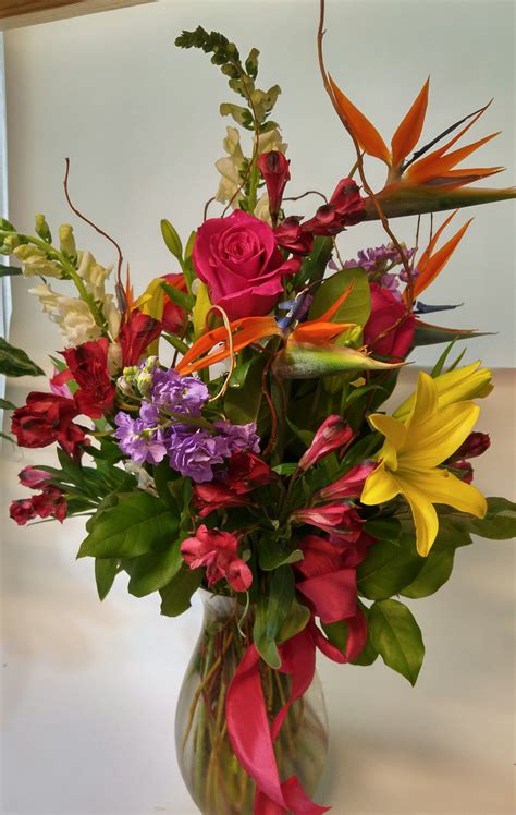 Tall Mixed Arrangement Featuring Some Tropical Flowers By Petals