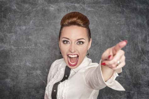 Angry Screaming Teacher Pointing Out Stock Photo Image Of Desk