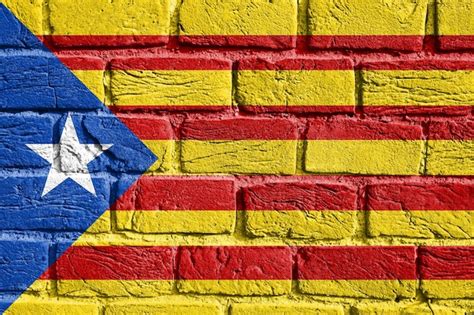 Premium Photo Flag Of Catalonia On The Wall