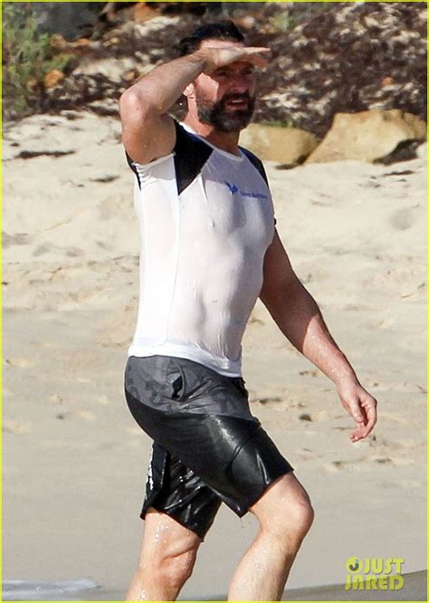 Hugh Jackman S Abs Poke Out Of His Wet Shirt At The Beach Photo Hugh Jackman Photos
