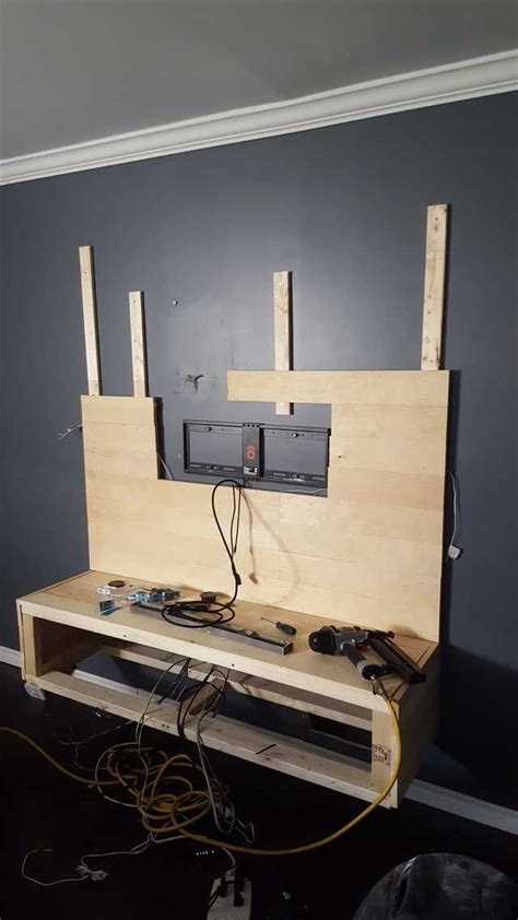 We can custom build and install a floating wall tv unit with and door/drawer/shelving layout needed for your space. DIY Floating Entertainment Unit and Wall Covering ...