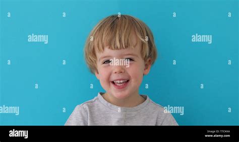 Little Boy Laughing At Camera Stock Photo Alamy