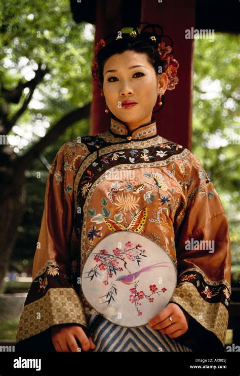 Beautiful Chinese Woman In Traditional Clothing In Xian Park Stock