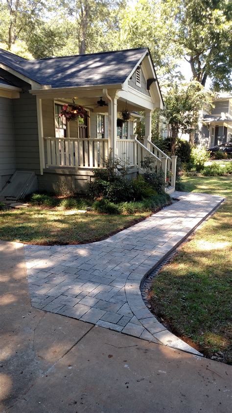 We'll show you how to build it and give you ideas to turn a simple paving stone walkway into a focal point for your outdoors.start by deciding on a pattern and style. Concrete Paver Walkway : DIY