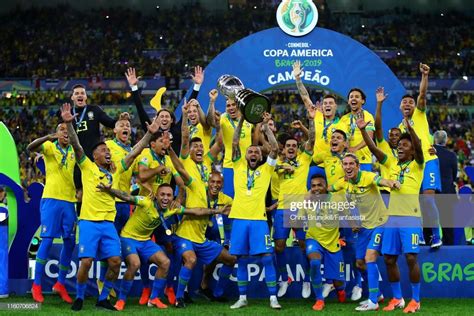 Dani Alves Of Brazil Lifts The Trophy Following The Copa America