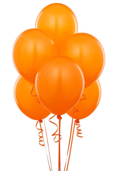 A Bunch Of Orange Balloons Are In The Air
