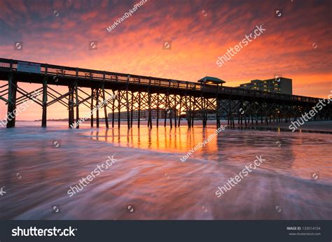 Folly Beach Pier Charleston South Carolina Vibrant Sunset On The Beach