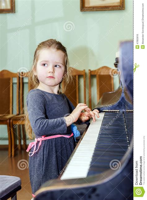 Cute Little Girl Playing Grand Piano Stock Photo Image Of