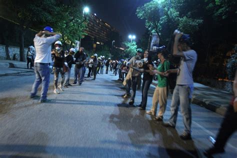 Riot Police Fire Water Cannons And Tear Gas To Drive Protesters Out Of