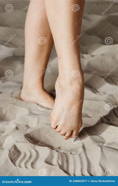 Close Up Of Woman Feet Walking Barefoot On Sand Beautiful Female Feet