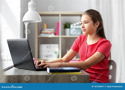 Stock Photo Little Girl In Front Of Laptop Computer