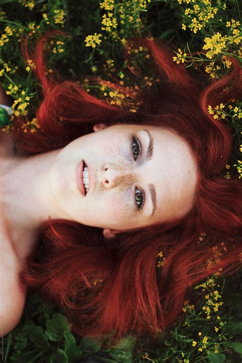 Beautiful Ginger Haired Woman Among The Flowers By Stocksy Contributor Jovana Rikalo Stocksy