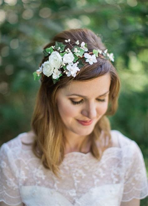 A Woman Wearing A Flower Crown On Her Head