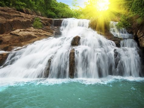 Waterfall In Rain Forest And Sunlight Wall Mural And Photo Wallpaper