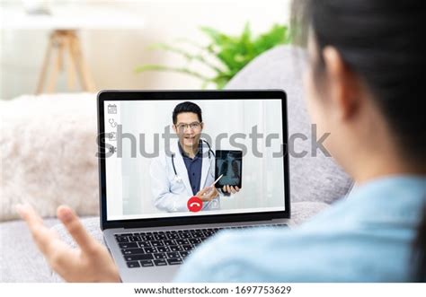 Asian Chinese Doctor Video Conference Call Online Talking For Follow Up