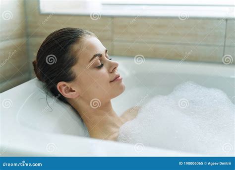 The Woman Bathes In A Bathtub With White Foam Stock Image Image Of Care Natural 190006065