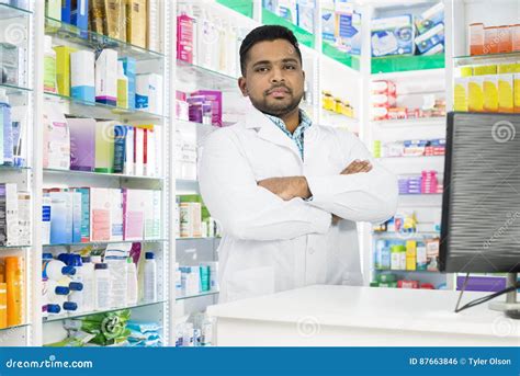 Confident Chemist In Labcoat Standing Arms Crossed Stock Photo Image