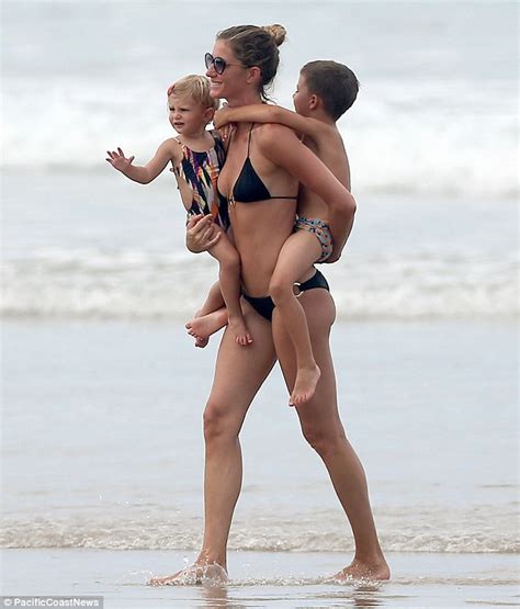 Gisele Bundchen Carries Daughter And Son On The Beach In Costa Rica