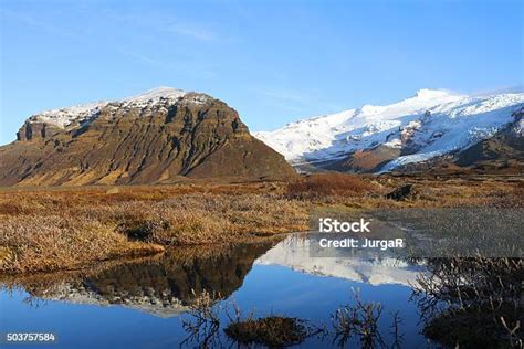 Moutain Reflections And Volcanic Landscape In Southern Iceland Stock