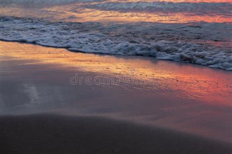 Purple Orange Sunset Baltic Sea And Surf In Autumn Stock