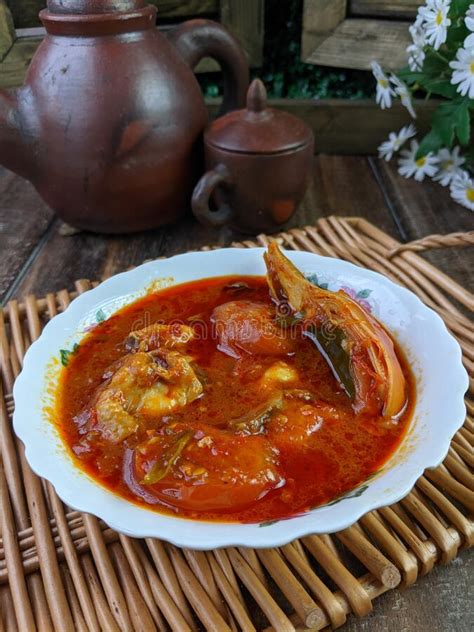 Malaysia Hot Spicy And Sour Fish Chicken Called Asam Pedas Stock Photo