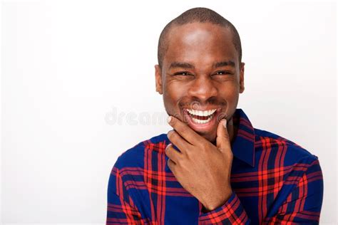 Close Up Happy Young African American Guy Laughing Against White